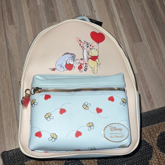 Disney Handbags - DISNEY her universe Winnie the Pooh friends hearts mini backpack!